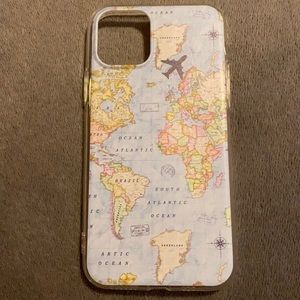 iPhone 11 Pro with map and plane print